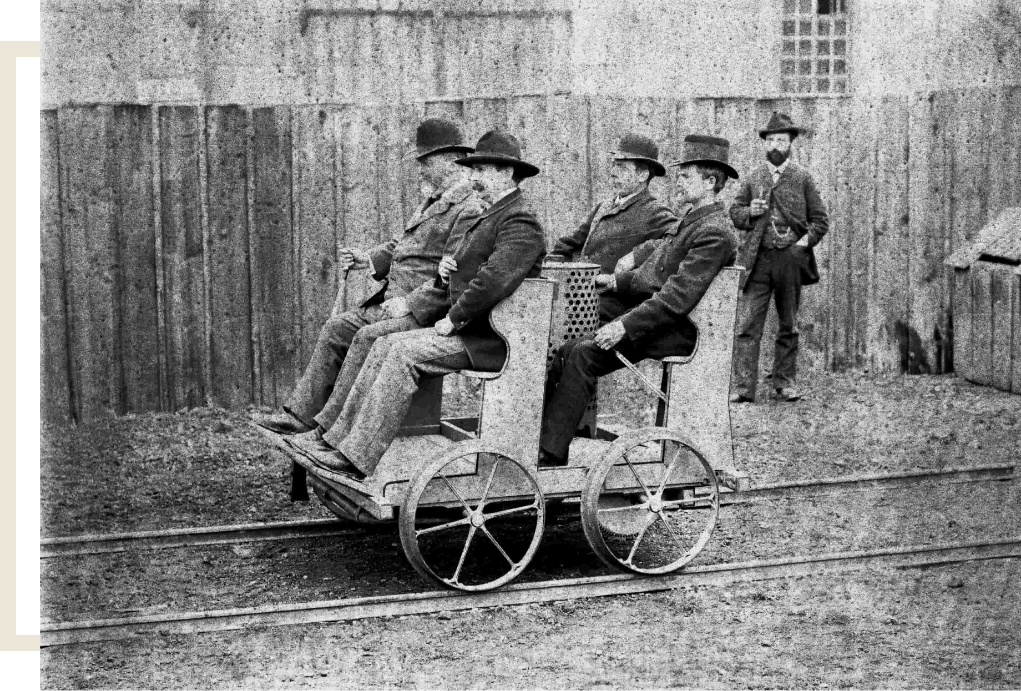 Presentation Of The Motor-Driven Trolley In 1887. Daimler In The Front Right, Maybach In The Back Left